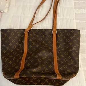 Authentic LV Carryall. There is still a lot of life in this beautiful bag.